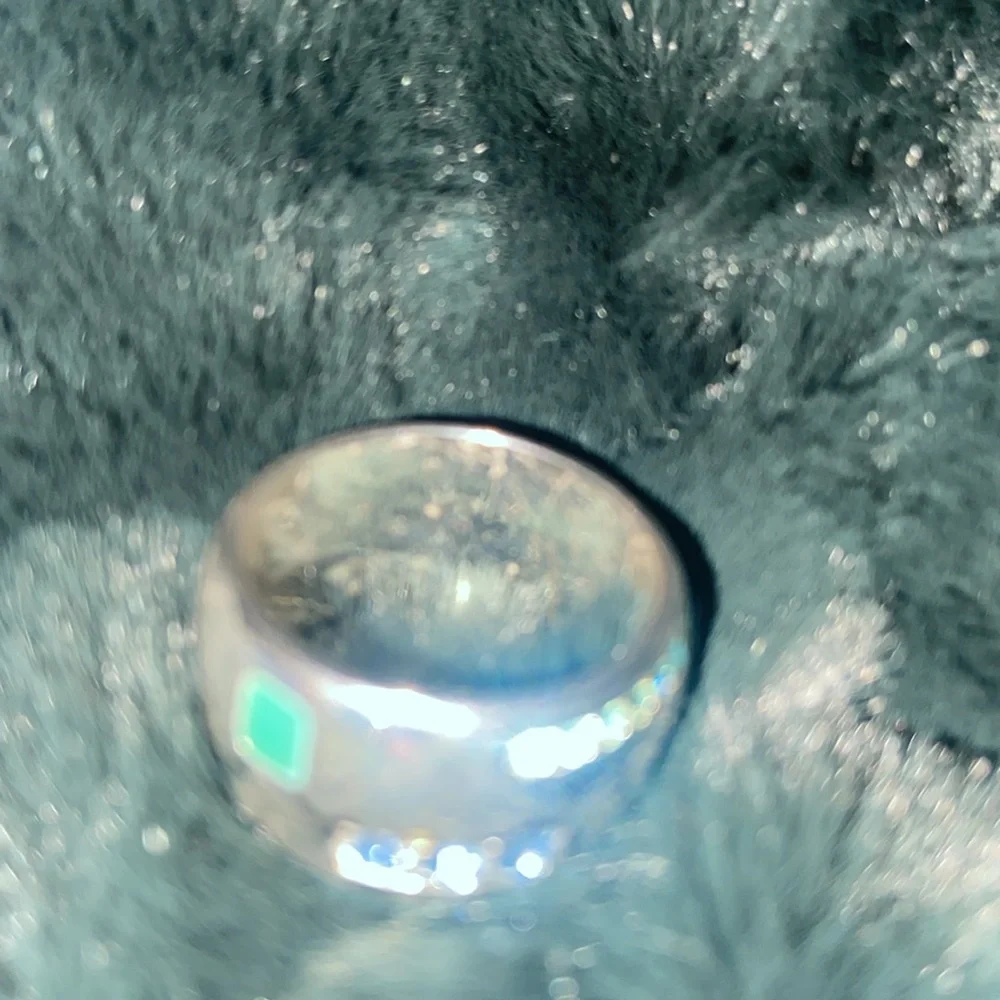 Silver tone band ring with green enamel and blue stones size 7.5/8